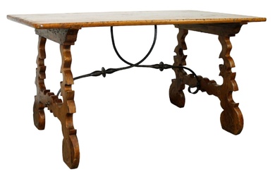 Spanish trestle base table in walnut with iron stretcher