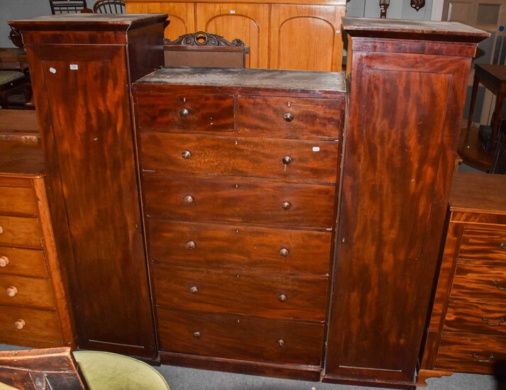 A piece of mahogany Victorian bedroom furniture with a...