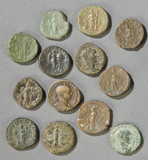 Thirteen Roman bronze sesterces S. I-III A.D.