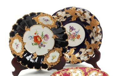 Three Meissen “Prunk” porcelain shallow bowls, decorated in basrelief and gilt with...