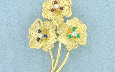 Vintage Dankner Emerald, Sapphire, Ruby, and Diamond Flower Pin in 18K Yellow Gold