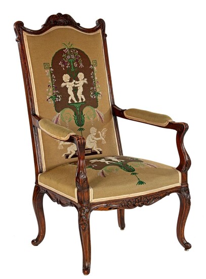 (-), Walnut armchair with a decor of angels...