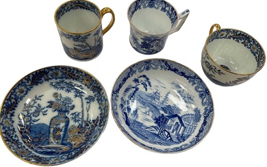 Wedgwood blue printed coffee cup and saucer, and another blue printed trio