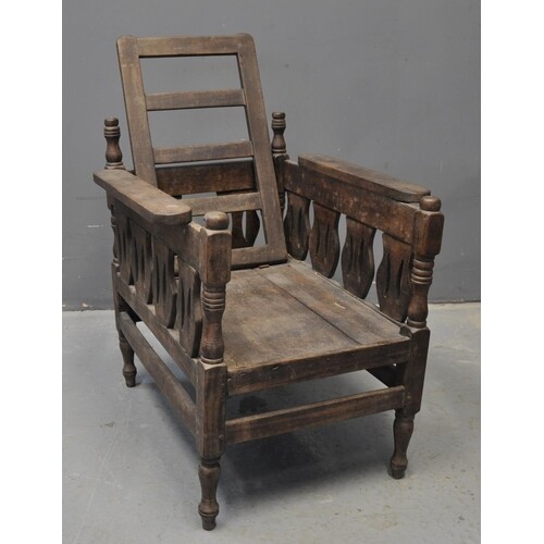 West African unusual hardwood colonial style reclining chair...