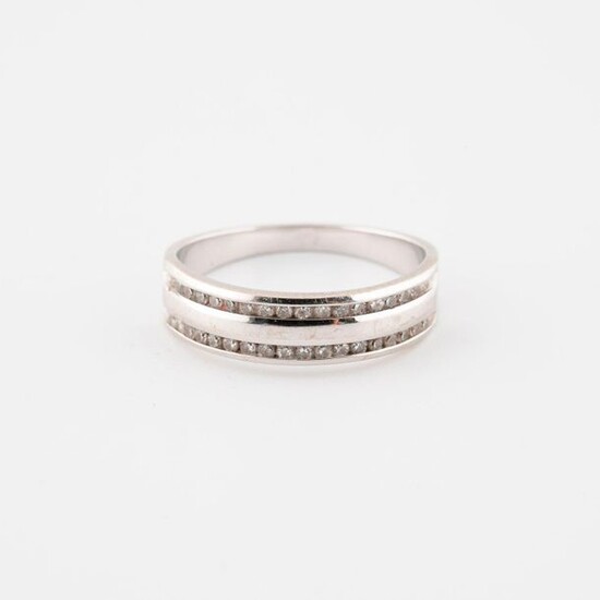 White gold wedding band (585) set with two lines of small eight-cut diamonds in rail-set.