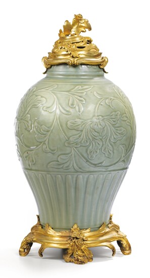 A Chinese carved Longquan celadon baluster vase, early Ming dynasty, ca. 14th/15th century, the mounts in Louis XV style, second half of 19th century