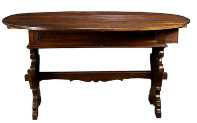 A French Provincial oak trestle table