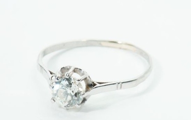 An 18 carat white gold and platinum ring with diamond