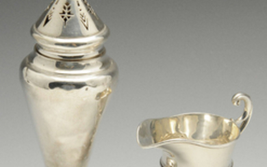 A 1920's small silver cream jug & 1930's silver caster. (2).