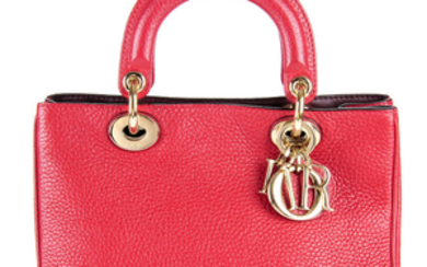 CHRISTIAN DIOR - a red Mini Diorissimo handbag.