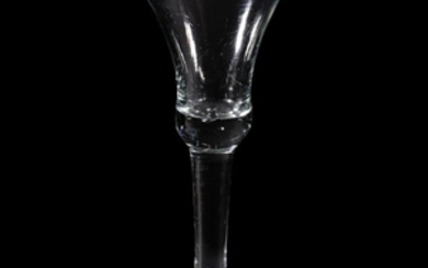 A large plain-stemmed wine glass