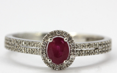 9CT RUBY AND DIAMOND RING.