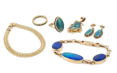 A 9ct gold and opal bracelet, with three oval doublet...