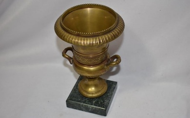 A Bronze Urn on an Onyx Base