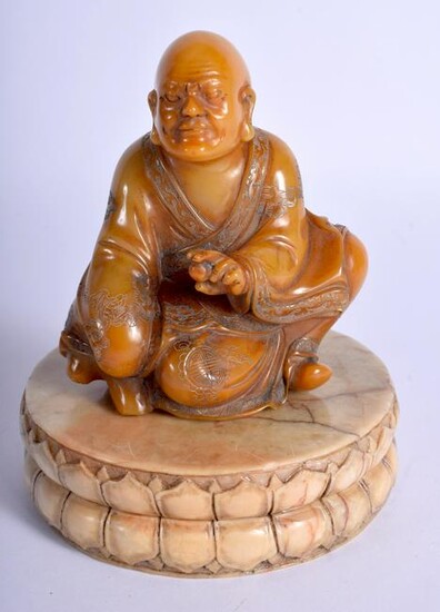 A CHINESE CARVED SOAPSTONE FIGURE OF A BUDDHA 20th