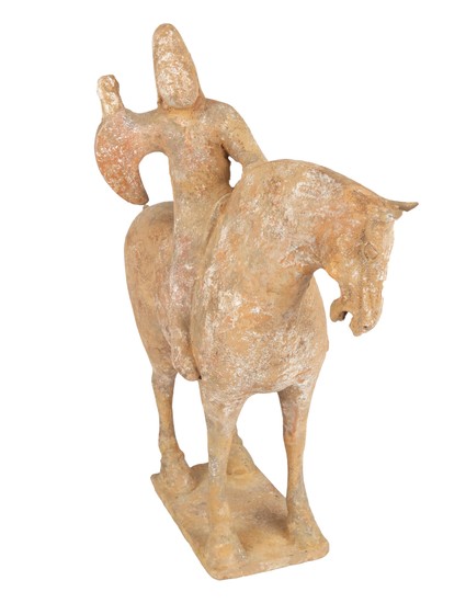 A CHINESE TERRACOTTA FIGURE OF A HORSERIDER, HAN DYNASTY (206 BC-220 BCE)