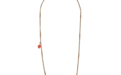 A CORAL STRAWBERRY AND ENAMEL LADYBIRD NECKLACE comprising a fancy link chain suspending a carved