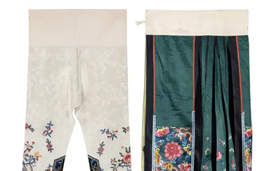 A Chinese emerald green silk embroidered apron skirt and a pair of...