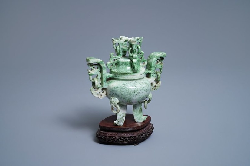 A Chinese jadeite censer and cover on wooden...
