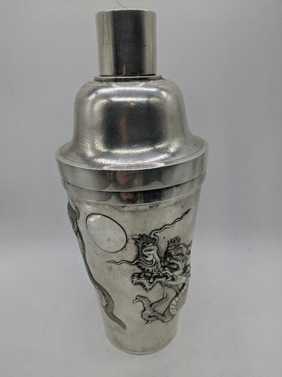 A Chinese silver cocktail shaker, embossed with dragon