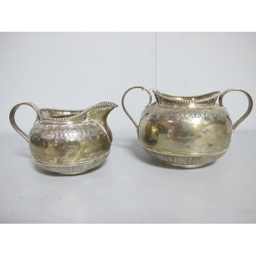 A Decorative Victorian Hallmarked Silver Jug and Twin handle...