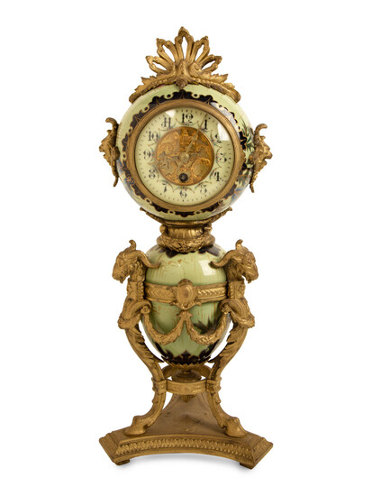 A French Gilt Bronze and Glazed Pottery Clock