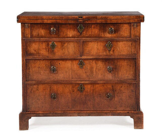 A GEORGE II WALNUT BACHELOR'S CHEST OF DRAWERS, CIRCA 1740