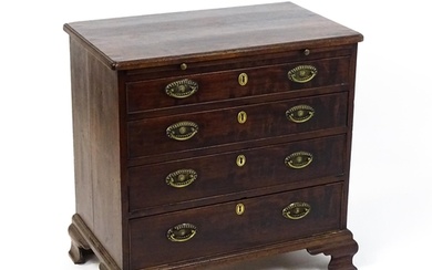A George III mahogany bachelors chest of drawers, the moulde...
