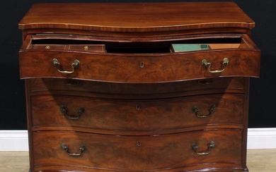 A George III mahogany serpentine bachelor’s chest, slightly ...