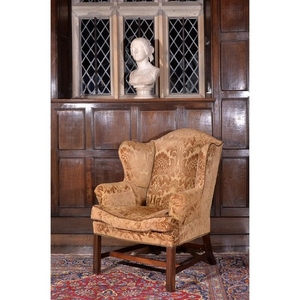 A George III mahogany wing armchair, circa 1780