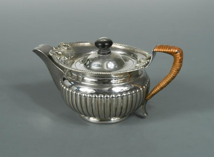 A George III silver bachelor teapot