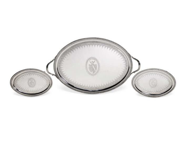 A George III silver two-handled tray and a pair of matching oval waiters, John Crouch I & Thomas Hannam, London, 1792