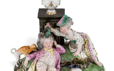 A Hochst porcelain group of Der Berkrantze Schlafer, c.1770, blue wheel mark, modelled by J.P. Melchior, with a sleeping farm boy, a dog beside him and a shepherdess leaning over him to garland his head with flowers, her hoe and satchel nearby, a...