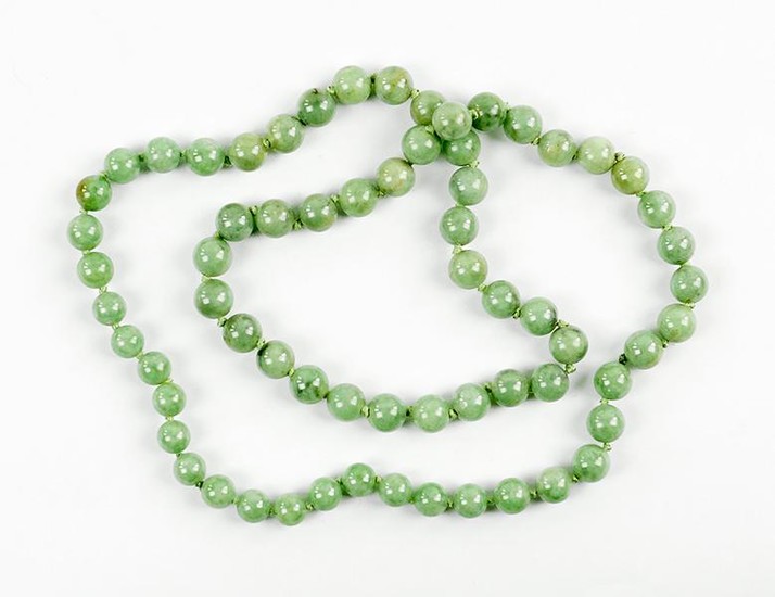 A Jade Bead Necklace.