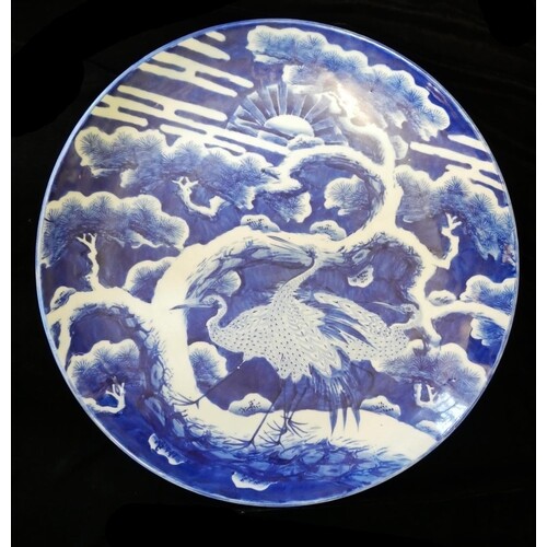 A LARGE JAPANESE IMARI BLUE AND WHITE CHARGER PLATE Hand pai...