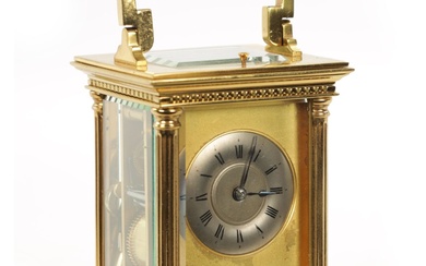 A LATE 19TH CENTURY FRENCH BRASS REPEATING CARRIAGE CLOCK...