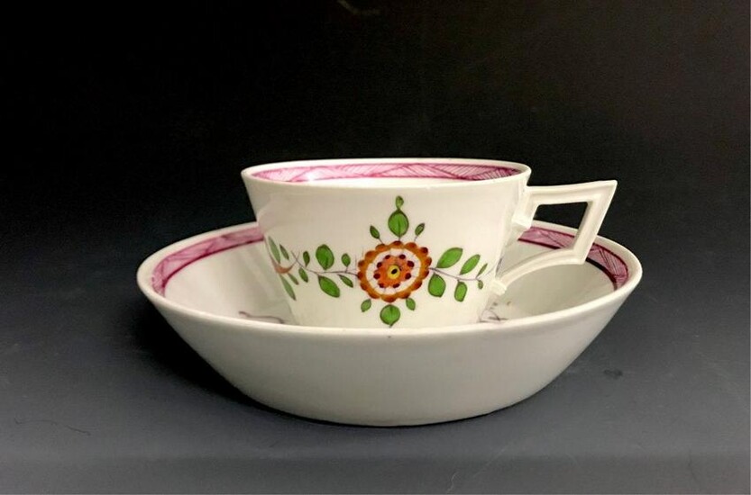 A MEISSEN MARCOLINI CUP AND SAUCER