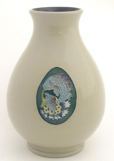 A Moorcroft trial vase in the shape 7/5, decorated with