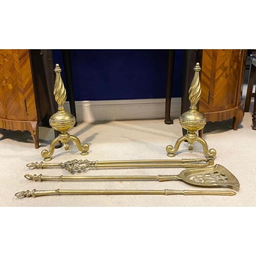 A PAIR OF ANTIQUE ORNATE GILT BRASS FIREDOGS, along with an ...