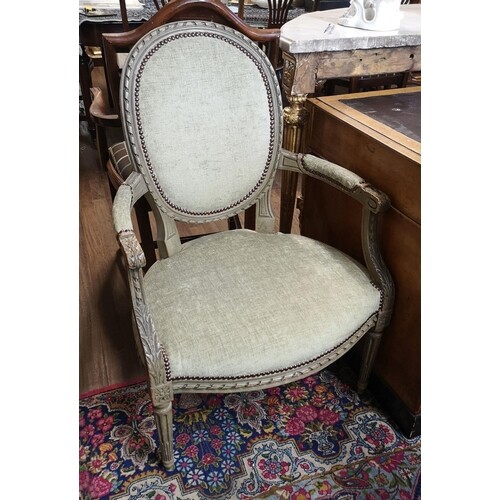 A PAIR OF FRENCH SPOON BACK OPEN ARMCHAIRS Green painted fra...