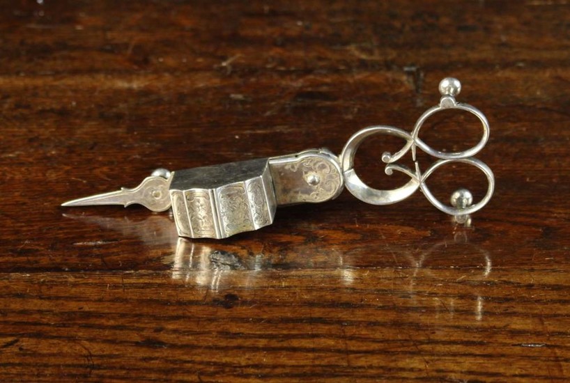 A Pair of Fine Silver Plated Sprung Scissor Action Candle Snuffer engraved with flowers and foliage.