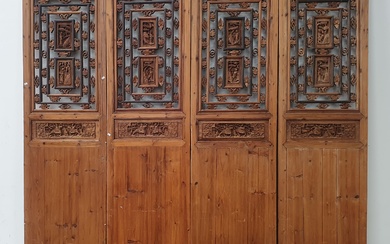 A SET OF FOUR MID-19TH CENTURY CHINESE PINE PANELS