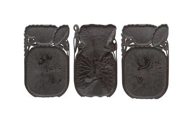 A SET OF THREE CARVED WOOD LOTUS TRAYS