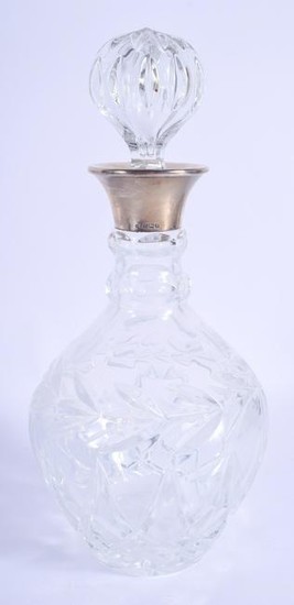 A SILVER MOUNTED GLASS DECANTER. 28 cm high.