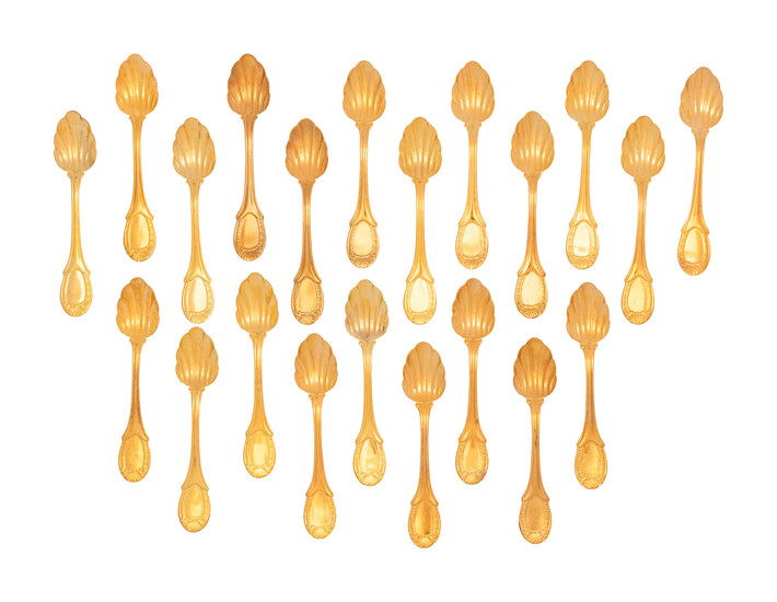 A Set of Twenty-One Gilt Metal Dessert Spoons