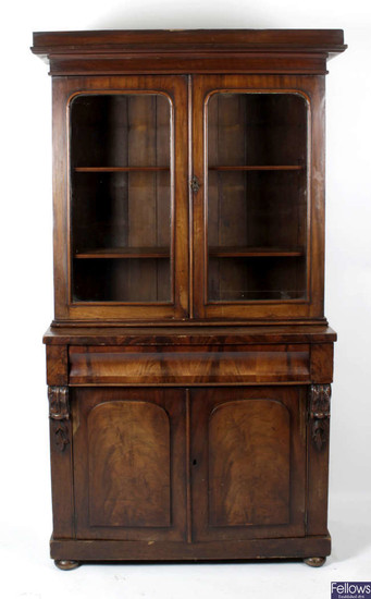 A Victorian mahogany bookcase, the upper section with