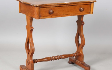 A Victorian mahogany side table, the serpentine shaped top above a single drawer, height 70cm, width