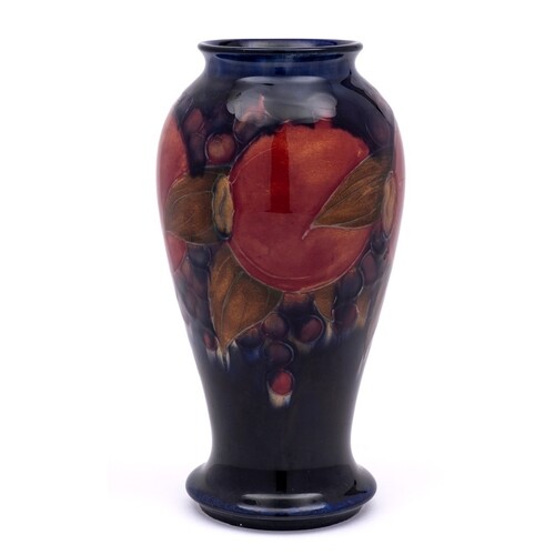 A William Moorcroft baluster vase: tube-lined and decorated ...