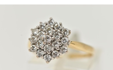 A YELLOW METAL DIAMOND CLUSTER RING, cluster set with round ...