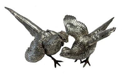 A brace of 20th century German metalwares silver pheasants